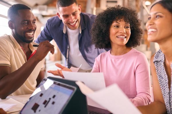 multi-cultural-business-team-meeting-around-desk-i-2024-10-19-18-12-40-utc (1)